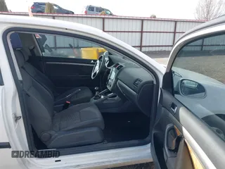2008 Volkswagen Rabbit S with VIN WVWAA71K48W129801, listed as a IAAI auction lot 41817759 with 215,004 mi miles. Bid and sale history available at carsss.com. Image 5.
