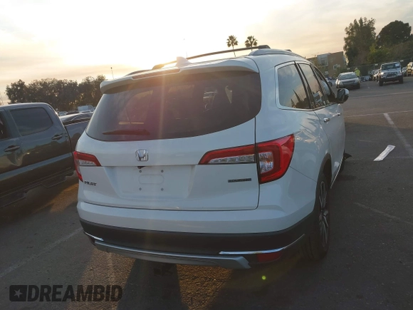 2019 Honda Pilot Touring 8-Passenger with VIN 5FNYF5H97KB005203, listed as a IAAI auction lot 41399930 with 47,267 mi miles and . Bid and sale history available at DreamBid. Image 16.