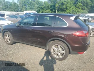 2014 Porsche Cayenne Diesel with VIN WP1AF2A23ELA49051, listed as a Copart auction lot 63105015 with 145,894 mi miles and Salvage title. Bid and sale history available at DreamBid. Image 2.