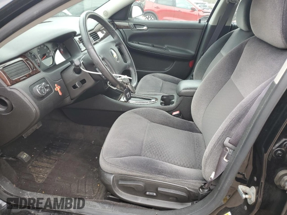 2014 Chevrolet Impala LT with VIN 2G1WB5E3XE1177552, listed as a Copart auction lot 54199115 with 29,319 mi miles and Salvage Title. Bid and sale history available at DreamBid. Image 7.