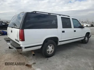 1996 Chevrolet Suburban with VIN 3GNEC16R5TG149147, listed as a Copart auction lot 84827204 with 320,305 mi miles and Salvage title. Bid and sale history available at DreamBid. Image 3.