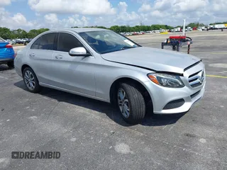 2015 Mercedes-Benz C C 300 Luxury with VIN 55SWF4KB9FU033375, listed as a IAAI auction lot 42186200 with 115,307 mi miles. Bid and sale history available at carsss.com. Image 1.