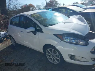 2019 Ford Fiesta SE with VIN 3FADP4EJ9KM123940, listed as a IAAI auction lot 40980644 with 102,240 mi miles. Bid and sale history available at carsss.com. Image 13.