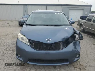 2014 Toyota Sienna XLE with VIN 5TDYK3DC2ES520840, listed as a Copart auction lot 59672295 with 194,143 mi miles and Salvage title. Bid and sale history available at DreamBid. Image 5.