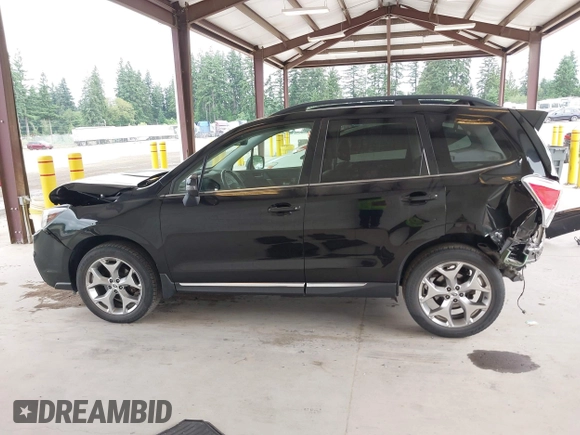 2018 Subaru Forester Touring with VIN JF2SJAWC2JH598982, listed as a IAAI auction lot 42455652 with 57,254 mi miles and . Bid and sale history available at DreamBid. Image 15.