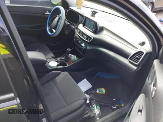 2019 Hyundai Tucson SE with VIN KM8J2CA46KU977863, listed as a IAAI auction lot 41704318 with 23,076 mi miles. Bid and sale history available at carsss.com. Image 5.
