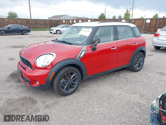 2013 MINI Countryman S with VIN WMWZC3C57DWP21892, listed as a IAAI auction lot 42402600 with 59,700 mi miles and . Bid and sale history available at DreamBid. Image 2.
