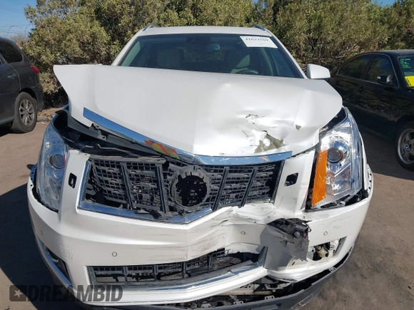 2013 Cadillac SRX Performance Collection with VIN 3GYFNDE37DS599557, listed as a IAAI auction lot 41633569 with 100,611 mi miles and . Bid and sale history available at DreamBid. Image 12.