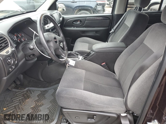 2009 GMC Envoy SLE with VIN 1GKDS33S592102331, listed as a Copart auction lot 82414164 with 53,613 mi miles and Clean Title. Bid and sale history available at carsss.com. Image 7.
