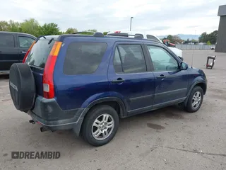 2003 Honda CR-V EX with VIN JHLRD78853C001990, listed as a IAAI auction lot 42151771 with 306,724 mi miles and . Bid and sale history available at carsss.com. Image 4.