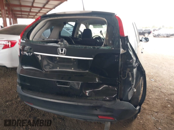 2013 Honda CR-V LX with VIN 2HKRM3H36DH511653, listed as a IAAI auction lot 39041262 with 90,336 mi miles and . Bid and sale history available at DreamBid. Image 6.