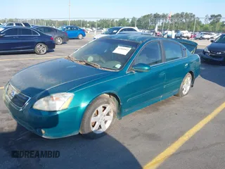 2003 Nissan Altima S with VIN 1N4AL11DX3C128760, listed as a IAAI auction lot 41980962 with 249,200 mi miles. Bid and sale history available at carsss.com. Image 2.