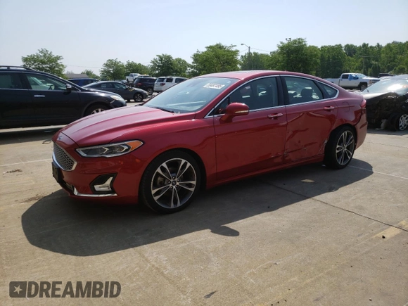 2020 Ford Fusion Titanium with VIN 3FA6P0K92LR164040, listed as a Copart auction lot 59497495 with 74,812 mi miles and Salvage title. Bid and sale history available at DreamBid. Image 1.