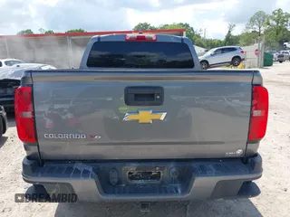 2020 Chevrolet Colorado 2WD Work Truck z VIN 1GCGSBEN5L1250342, wystawiony jako IAAI lot #42385150 z przebiegiem 56 302 mil mil oraz . Historia ofert i sprzedaży dostępna na DreamBid. Obrazek 15.
