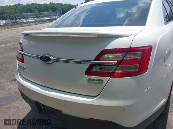 2015 Ford Taurus SHO with VIN 1FAHP2KT5FG206096, listed as a IAAI auction lot 42486198 with 120,940 mi miles and . Bid and sale history available at DreamBid. Image 16.
