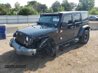 2012 Jeep Wrangler Unlimited Sport with VIN 1C4BJWDG8CL116811, listed as a Copart auction lot 59372085 with 95,498 mi miles and Salvage title. Bid and sale history available at DreamBid. Image 1.