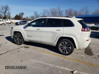 2019 Jeep Cherokee Overland with VIN 1C4PJMJN3KD173830, listed as a Copart auction lot 87229794 with 82,433 mi miles and Salvage title. Bid and sale history available at DreamBid. Image 2.