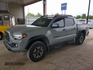 2023 Toyota Tacoma SR with VIN 3TMCZ5AN4PM564381, listed as a Copart auction lot 58182015 with 29,964 mi miles and Salvage title. Bid and sale history available at DreamBid. Image 1.