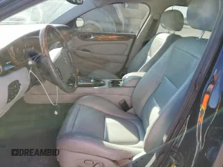 2006 Jaguar XJ with VIN SAJWA79B66SH07528, listed as a Copart auction lot 80396994 with 114,922 mi miles and Clean Title. Bid and sale history available at carsss.com. Image 7.