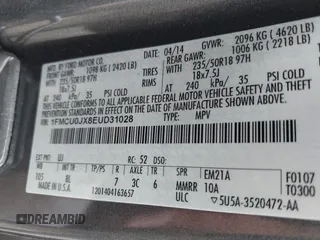 2014 Ford Escape Titanium with VIN 1FMCU0JX8EUD31028, listed as a IAAI auction lot 41943690 with 91,295 mi miles. Bid and sale history available at carsss.com. Image 9.