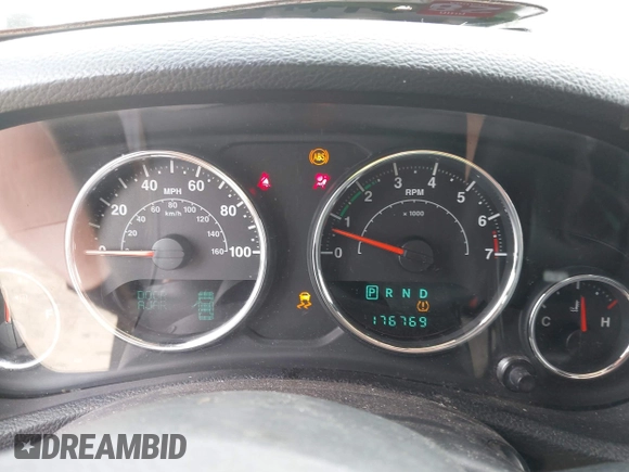 2014 Jeep Wrangler Unlimited Sahara with VIN 1C4HJWEG8EL292835, listed as a IAAI auction lot 42705672 with 176,769 mi miles and . Bid and sale history available at DreamBid. Image 7.