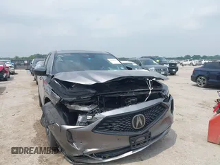 2022 Acura MDX w/A-Spec Package with VIN 5J8YE1H06NL050763, listed as a IAAI auction lot 42280138 with 30,037 mi miles and . Bid and sale history available at DreamBid. Image 6.