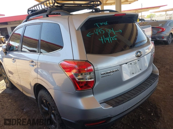 2014 Subaru Forester 2.5i Touring with VIN JF2SJAPCXEH495314, listed as a IAAI auction lot 42048073 with 156,998 mi miles. Bid and sale history available at carsss.com. Image 3.