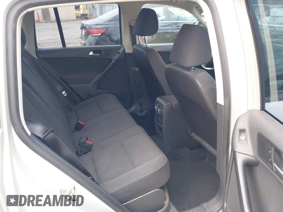 2013 Volkswagen Tiguan SEL with VIN WVGBV3AX1DW571843, listed as a IAAI auction lot 42540191 with 140,639 mi miles and . Bid and sale history available at DreamBid. Image 8.