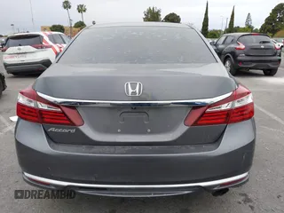 2017 Honda Accord LX with VIN 1HGCR2F35HA210567, listed as a IAAI auction lot 42067394 with 144,734 mi miles. Bid and sale history available at carsss.com. Image 16.