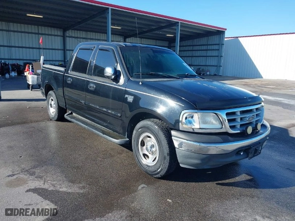 2001 Ford F-150 SuperCrew XLT with VIN 1FTRW07W41KA13131, listed as a IAAI auction lot 41922077 with 1 mi miles. Bid and sale history available at carsss.com. Image 1.
