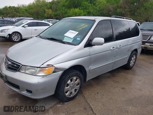 2004 Honda Odyssey EX with VIN 5FNRL18694B076305, listed as a IAAI auction lot 41929212 with 287,717 mi miles and . Bid and sale history available at DreamBid. Image 2.