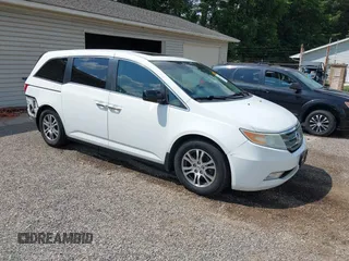 2011 Honda Odyssey EX-L with VIN 5FNRL5H65BB104640, listed as a IAAI auction lot 42602669 with 248,397 mi miles and . Bid and sale history available at DreamBid. Image 1.