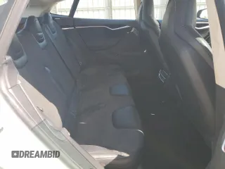2013 Tesla Model S with VIN 5YJSA1AC7DFP10881, listed as a Copart auction lot 61485235 with 107,032 mi miles and Salvage title. Bid and sale history available at DreamBid. Image 10.