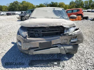 2015 Land Rover Range Rover Evoque Pure Premium z VIN SALVR2BG9FH005735, wystawiony jako Copart lot #69971924 z przebiegiem Nie podano mil oraz Szkoda całkowita • Salvage title. Historia ofert i sprzedaży dostępna na DreamBid. Obrazek 5.