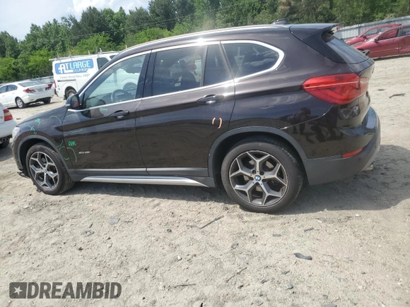 2017 BMW X1 xDrive28i z VIN WBXHT3C39H5F72979, wystawiony jako Copart lot #56003625 z przebiegiem 101 184 mil mil oraz Szkoda całkowita • Salvage title. Historia ofert i sprzedaży dostępna na DreamBid. Obrazek 2.