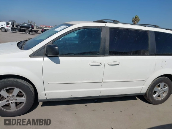 2010 Dodge Grand Caravan SE z VIN 2D4RN4DE5AR237793, wystawiony jako IAAI lot #42837195 z przebiegiem 267 873 mil mil oraz . Historia ofert i sprzedaży dostępna na DreamBid. Obrazek 14.