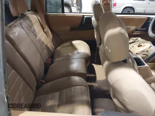 1997 Jeep Grand Cherokee Laredo z VIN 1J4GZ58YXVC729117, wystawiony jako IAAI lot #42244799 z przebiegiem Nie podano mil oraz . Historia ofert i sprzedaży dostępna na DreamBid. Obrazek 8.