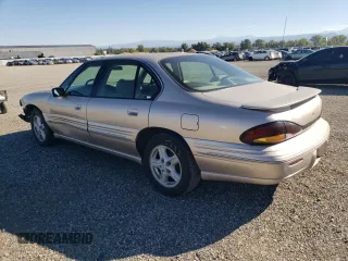 1999 Pontiac Bonneville SE z VIN 1G2HX52K4XH247855, wystawiony jako Copart lot #72559044 z przebiegiem 160 677 mil mil oraz Szkoda całkowita • Salvage title. Historia ofert i sprzedaży dostępna na DreamBid. Obrazek 2.