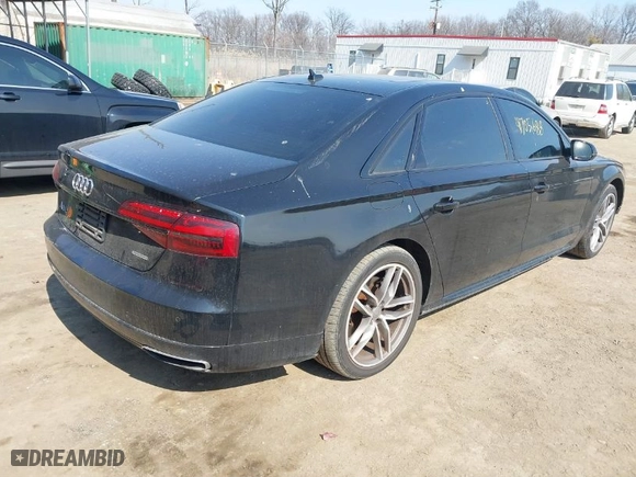 2017 Audi A8 L with VIN WAU44AFDXHN004395, listed as a IAAI auction lot 41705688 with 63,282 mi miles. Bid and sale history available at carsss.com. Image 4.