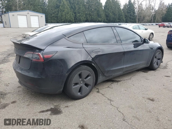 2023 Tesla Model 3 with VIN 5YJ3E1EA3PF644898, listed as a Copart auction lot 50427685 with 36,488 mi miles and Salvage Title. Bid and sale history available at DreamBid. Image 3.