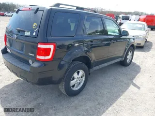 2009 Ford Escape XLT with VIN 1FMCU93GX9KC80750, listed as a IAAI auction lot 41953121 with 165,856 mi miles. Bid and sale history available at carsss.com. Image 4.