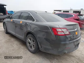2015 Ford Taurus SEL z VIN 1FAHP2E85FG209085, wystawiony jako IAAI lot #41944532 z przebiegiem 143 850 mil mil oraz . Historia ofert i sprzedaży dostępna na DreamBid. Obrazek 3.