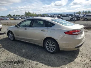2017 Ford Fusion Hybrid SE with VIN 3FA6P0LU8HR319135, listed as a Copart auction lot 57462035 with 75,288 mi miles and Salvage title. Bid and sale history available at DreamBid. Image 2.