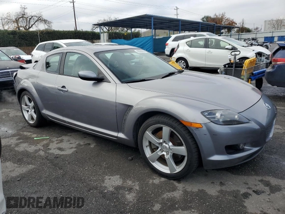2004 Mazda RX-8 with VIN JM1FE17N740117681, listed as a Copart auction lot 85284094 with 138,555 mi miles and Salvage Title. Bid and sale history available at DreamBid. Image 4.