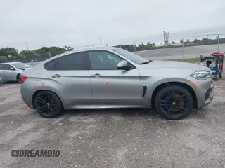2019 BMW X6 M with VIN 5YMKW8C59K0Y75102, listed as a IAAI auction lot 41347277 with 37,635 mi miles. Bid and sale history available at carsss.com. Image 14.