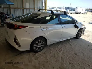 2021 Toyota Prius LE с VIN JTDKAMFP5M3186379, выставлен на аукционе Copart как лот 58527115 с пробегом 93 203 миль миль и Списание • Salvage title. История ставок и продаж доступна на DreamBid. Изображение 3.