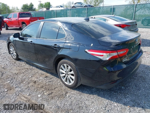 2019 Toyota Camry LE with VIN 4T1B11HK1KU718374, listed as a IAAI auction lot 42071905 with 86,460 mi miles and . Bid and sale history available at DreamBid. Image 3.