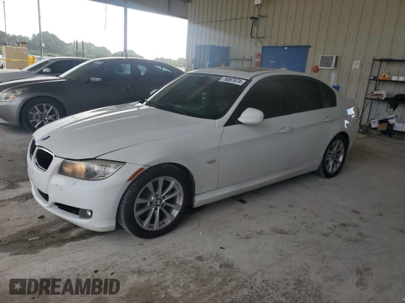 2011 BMW 3 Series 328i with VIN WBAPH7G50BNN06710, listed as a Copart auction lot 76987974 with 157,514 mi miles and Salvage Title. Bid and sale history available at carsss.com. Image 1.