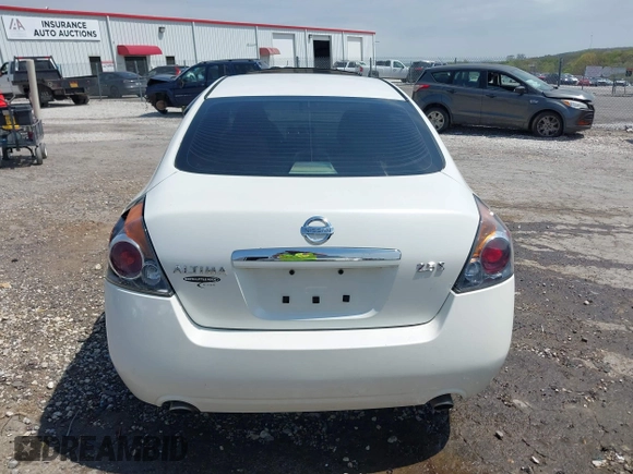 2009 Nissan Altima 2.5 S with VIN 1N4AL21E89N561120, listed as a IAAI auction lot 42020054 with 220,237 mi miles. Bid and sale history available at carsss.com. Image 16.