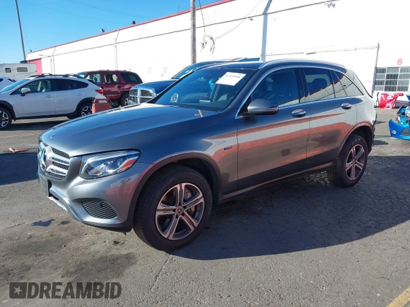 2019 Mercedes-Benz GLC 350e z VIN WDC0G5EB7KF619675, wystawiony jako IAAI lot #41549918 z przebiegiem 51 596 mil mil oraz . Historia ofert i sprzedaży dostępna na DreamBid. Obrazek 2.